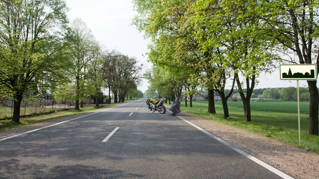 Should you move the damaged motorcycle onto the hard shoulder in this situation?