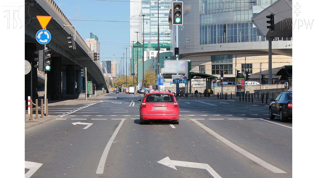 Does this road marking allow you to go straight through the intersection using this lane?