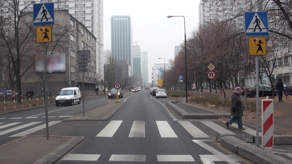 Does a broken line in front of a pedestrian crossing indicate a conditional stopping area?
