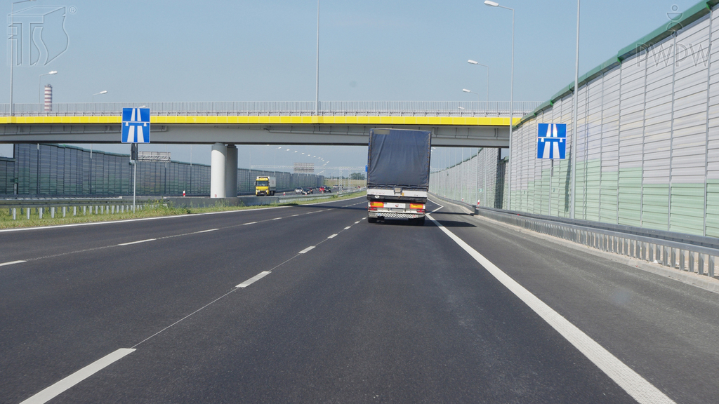 Can you perform a reverse manoeuvre on a motorway if you turn on the vehicle's hazard lights?