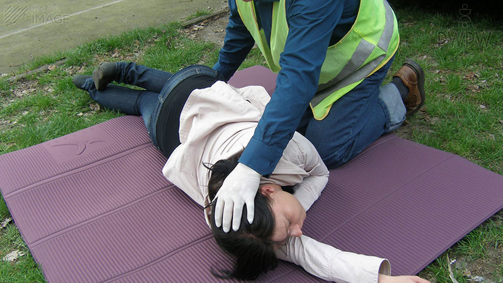 Should a person who has regained his breath but is unconscious be placed in the recovery position?