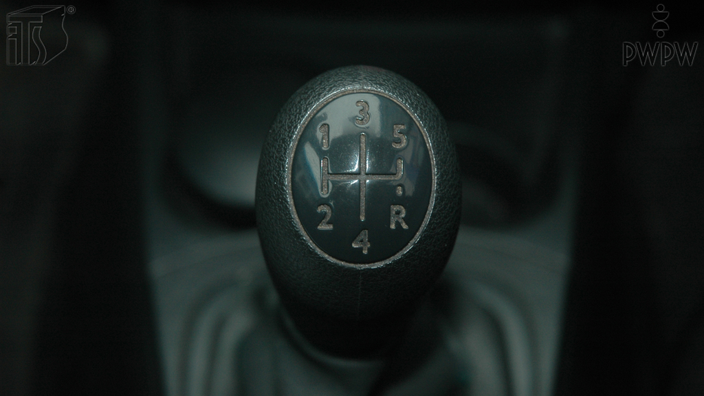 In what gear should you start driving on a dry surface?