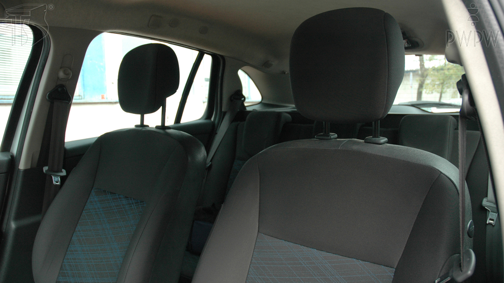 How many persons, including yourself, can you transport when you drive a passenger car?