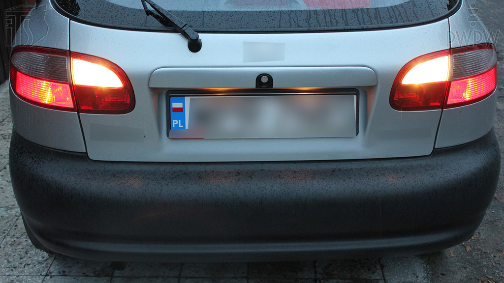 What is the function of reversing lights in a motor vehicle?