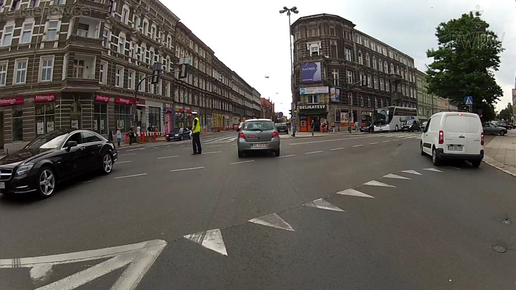 Do instructions and signs given by persons directing traffic have priority over road signs?