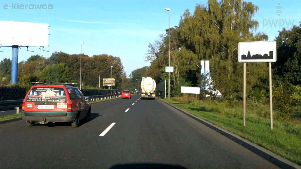 At what maximum speed are you allowed to drive on the road beyond this sign if you are hauling another passenger car?