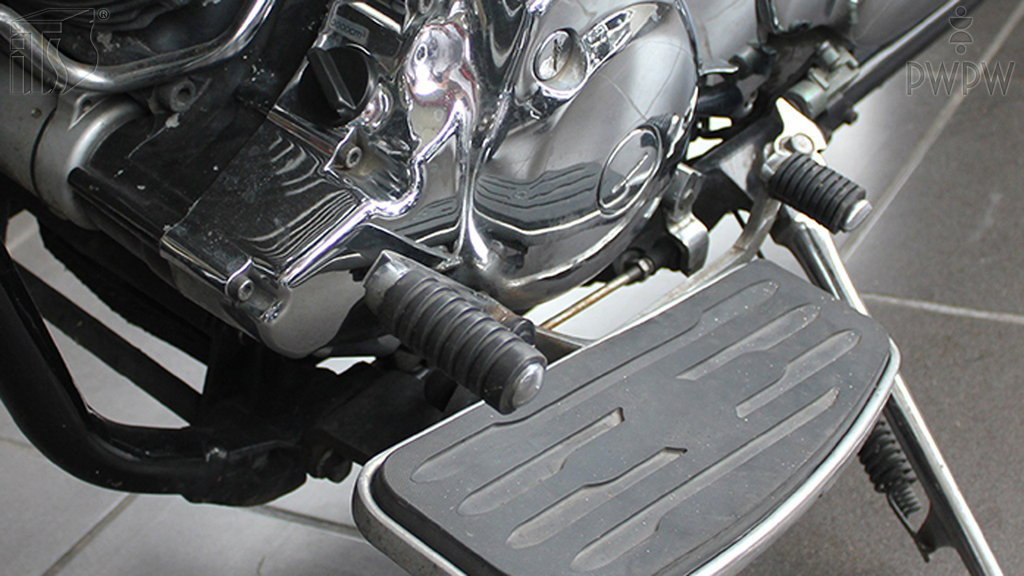 Where is the neutral position most commonly found in motorcycles equipped with a manual gear box?