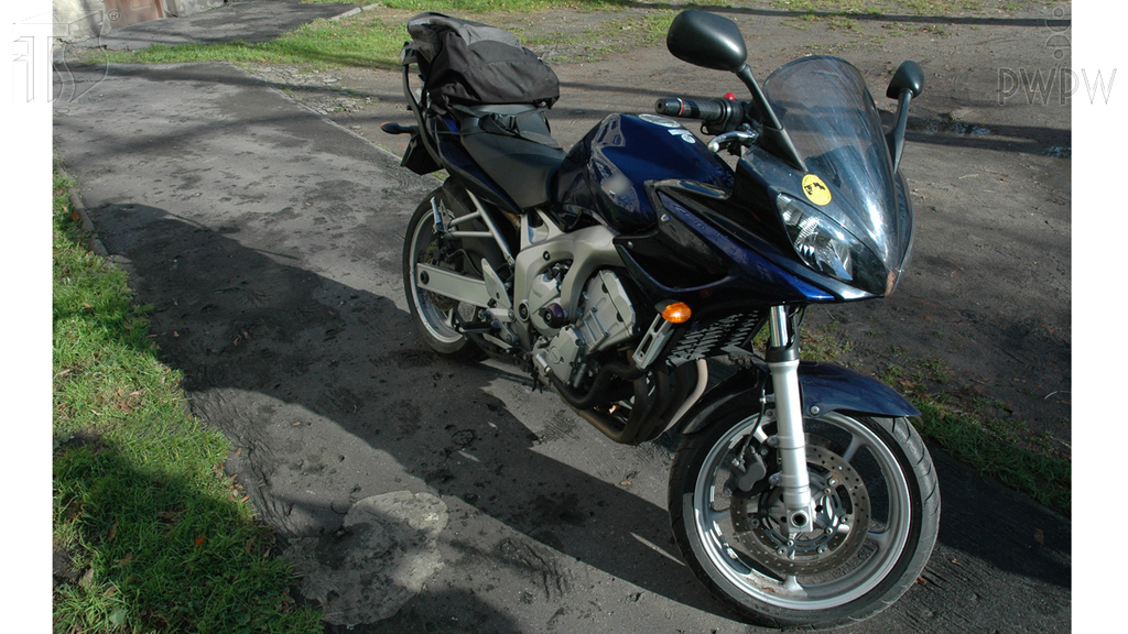 What must you mostly pay attention to when you secure a load being transported on a motorcycle?