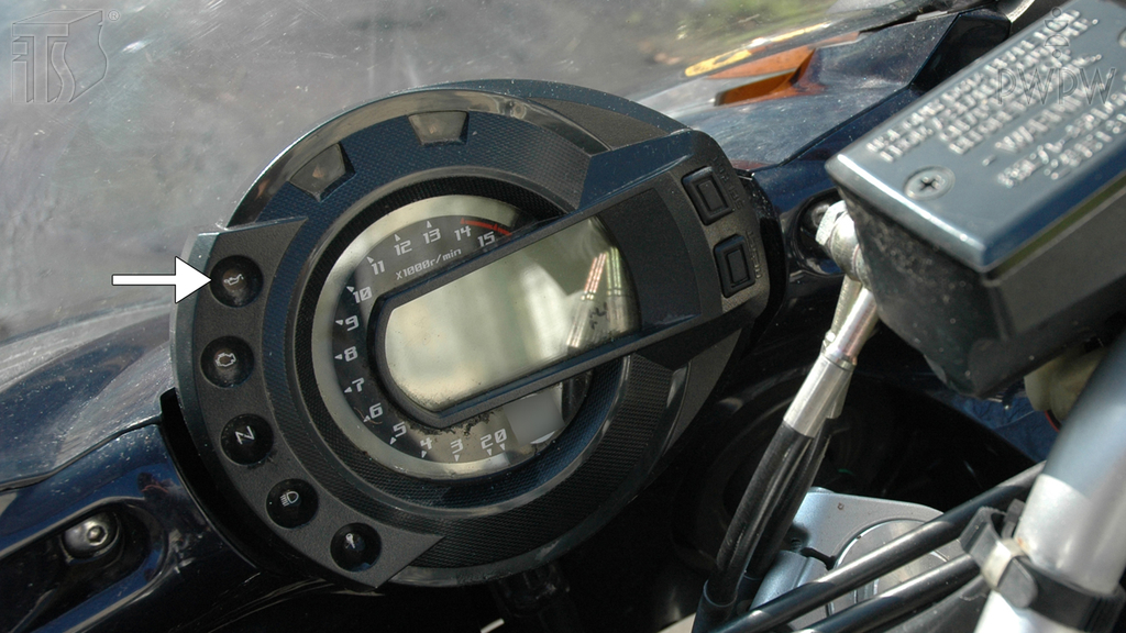 What should you do if the oil pressure control light comes on while you're riding a motorcycle?