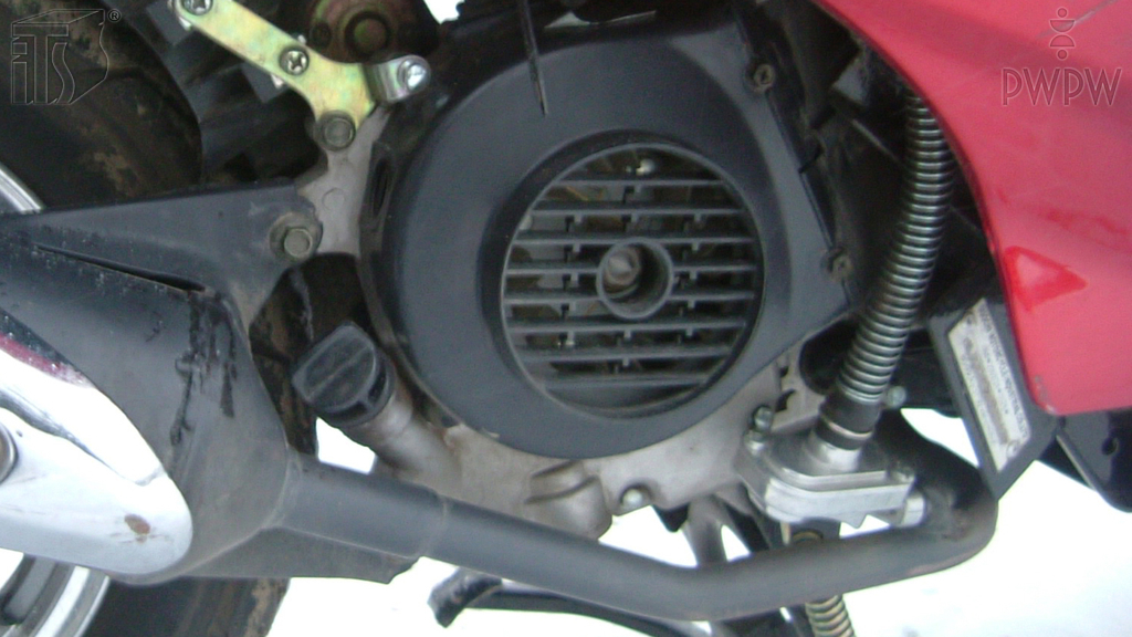 What should you do before you check the oil level in the engine?