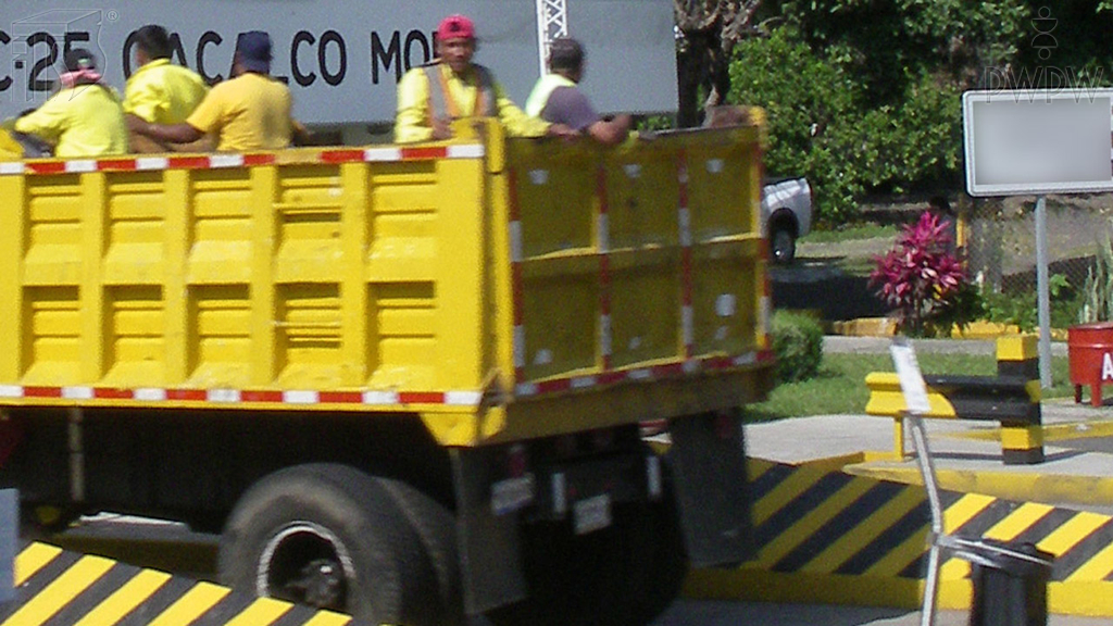What's the maximum speed at which you can drive a tractor if you transport a team of labourers in a trailer?