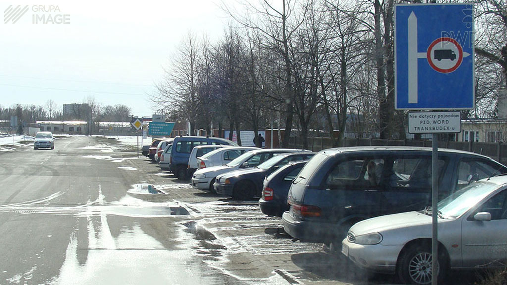 How does a wet road after the rain affect the braking distance?