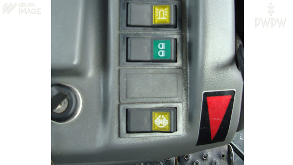 Which of the following options should you choose when driving a tractor on a muddy terrain?