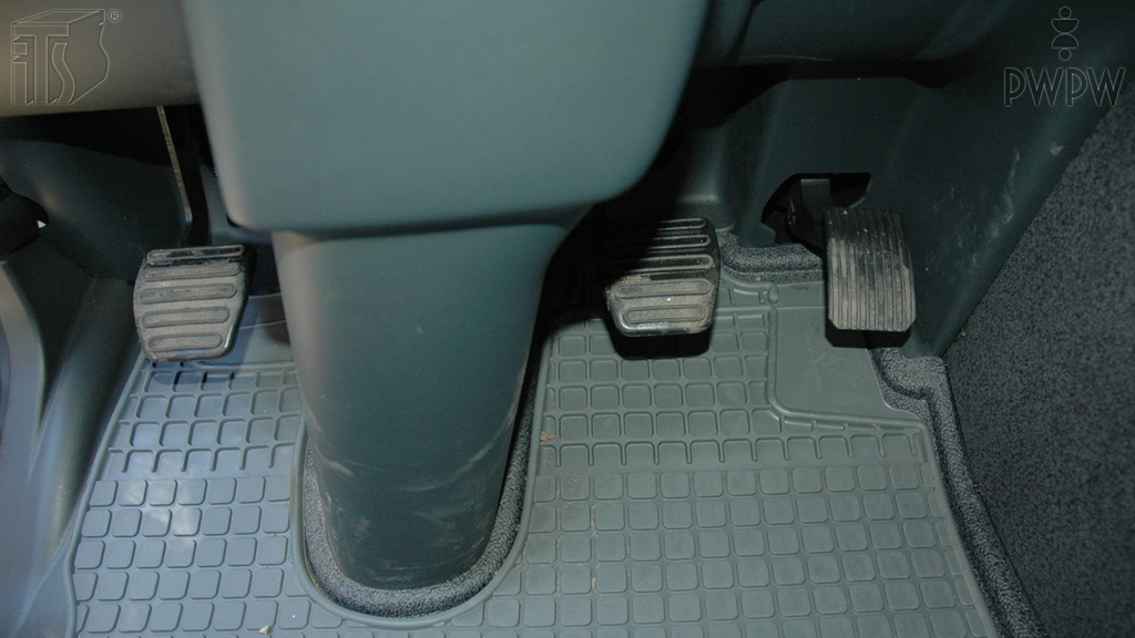 While driving a truck, at which point will you press the clutch if you intend to brake?