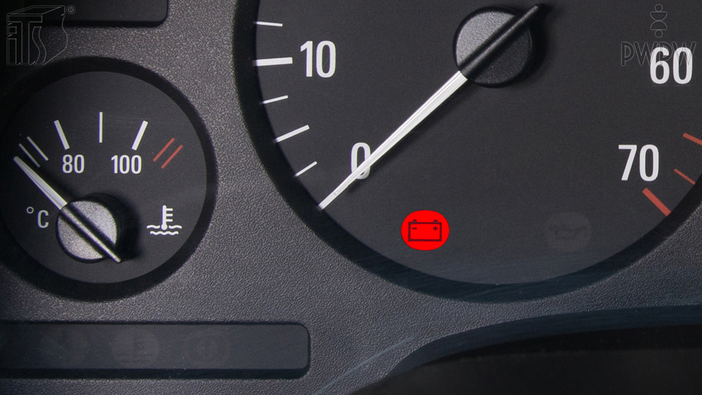 What does the warning light with the battery symbol turned red when on the move warn of?
