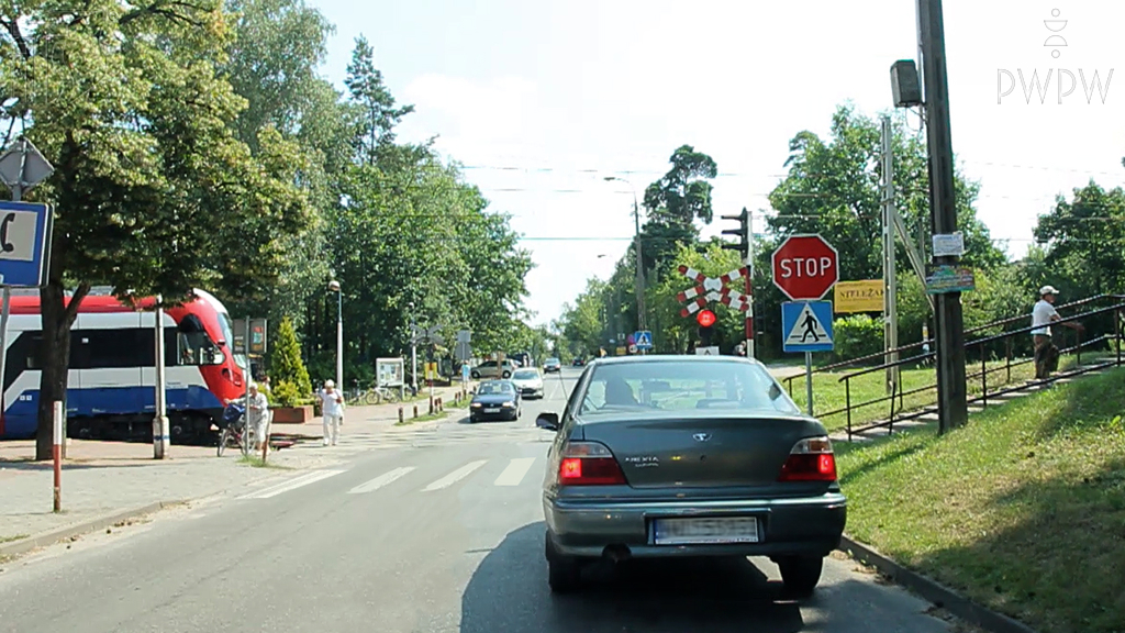 Should you stop behind the stationary vehicle in this situation?