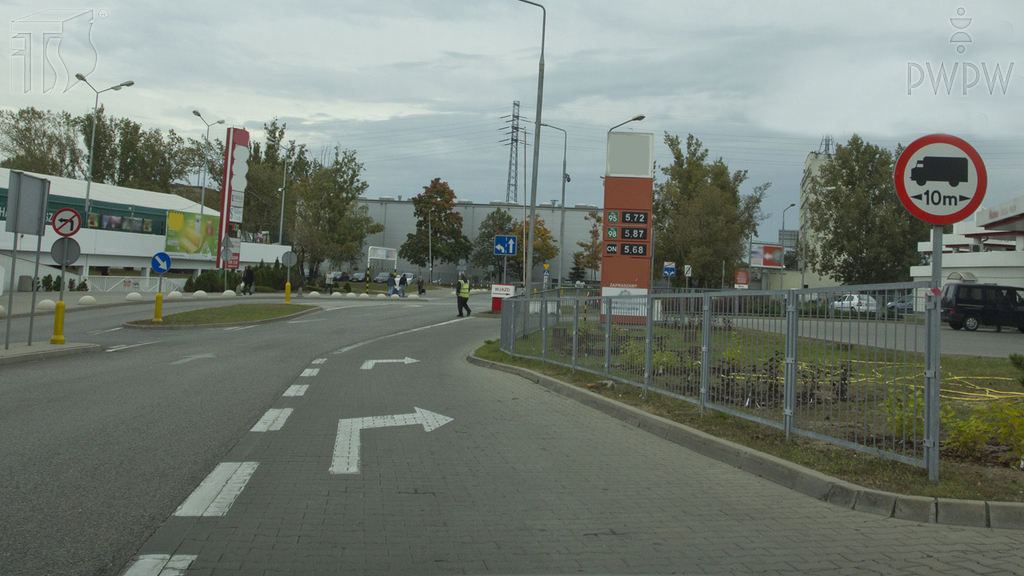 You are driving a combination of vehicles whose length is 10 metres, and carrying a load which protrudes from the back of the trailer at 0.5 metres. Are you allowed to drive onto the road beyond this sign?