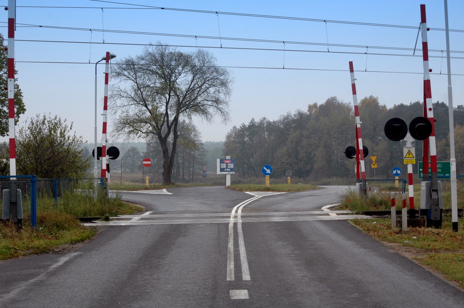 When approaching a level crossing with barriers, should you take into account that, for various reasons, the safety devices might not close the crossing in time?