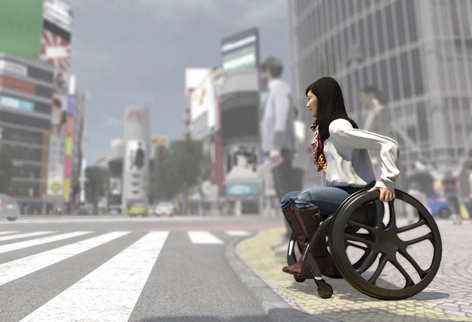 While exercising extreme caution, is it permissible to slowly drive past a person in a wheelchair who is entering a pedestrian crossing?