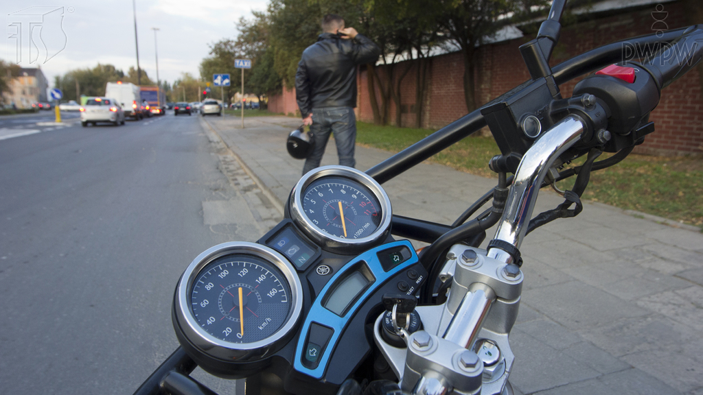 Is the motorcycle left unattended in the parking lot properly protected against being started by unauthorized person?