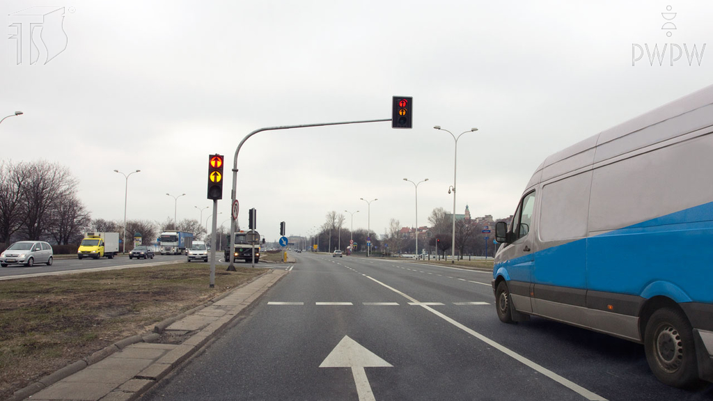 Does the traffic light displayed in this situation allow you to drive beyond the traffic light post?
