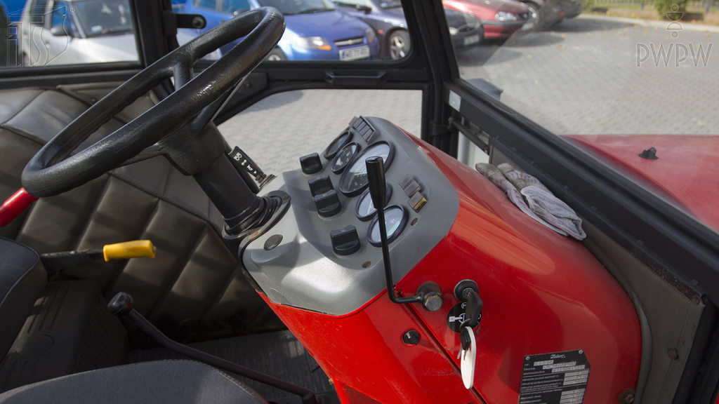 Are you allowed to move away from the parked tractor, if the engine is running?