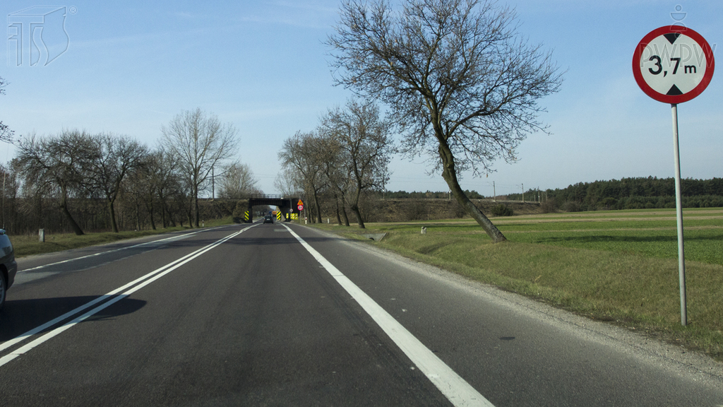 You are driving a vehicle whose height is 2.8 metres, loaded up to the height of 3.8 metres. Are you allowed to drive onto the road beyond this sign?