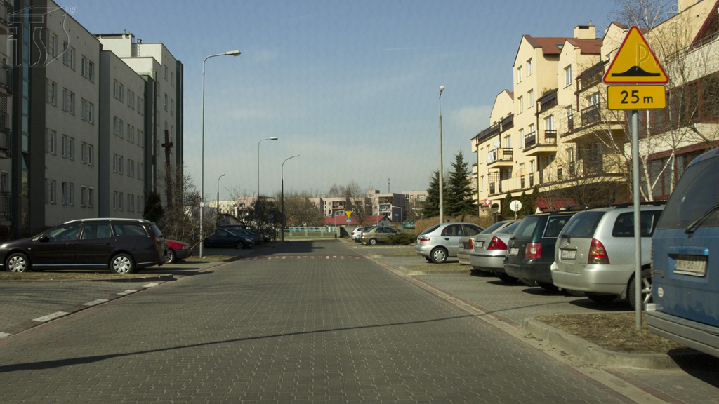 Does the board placed under this warning sign indicate the sign's distance from a dangerous spot?