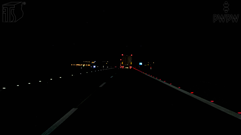 In this situation, do the red reflective point elements define the right edge of the roadway?